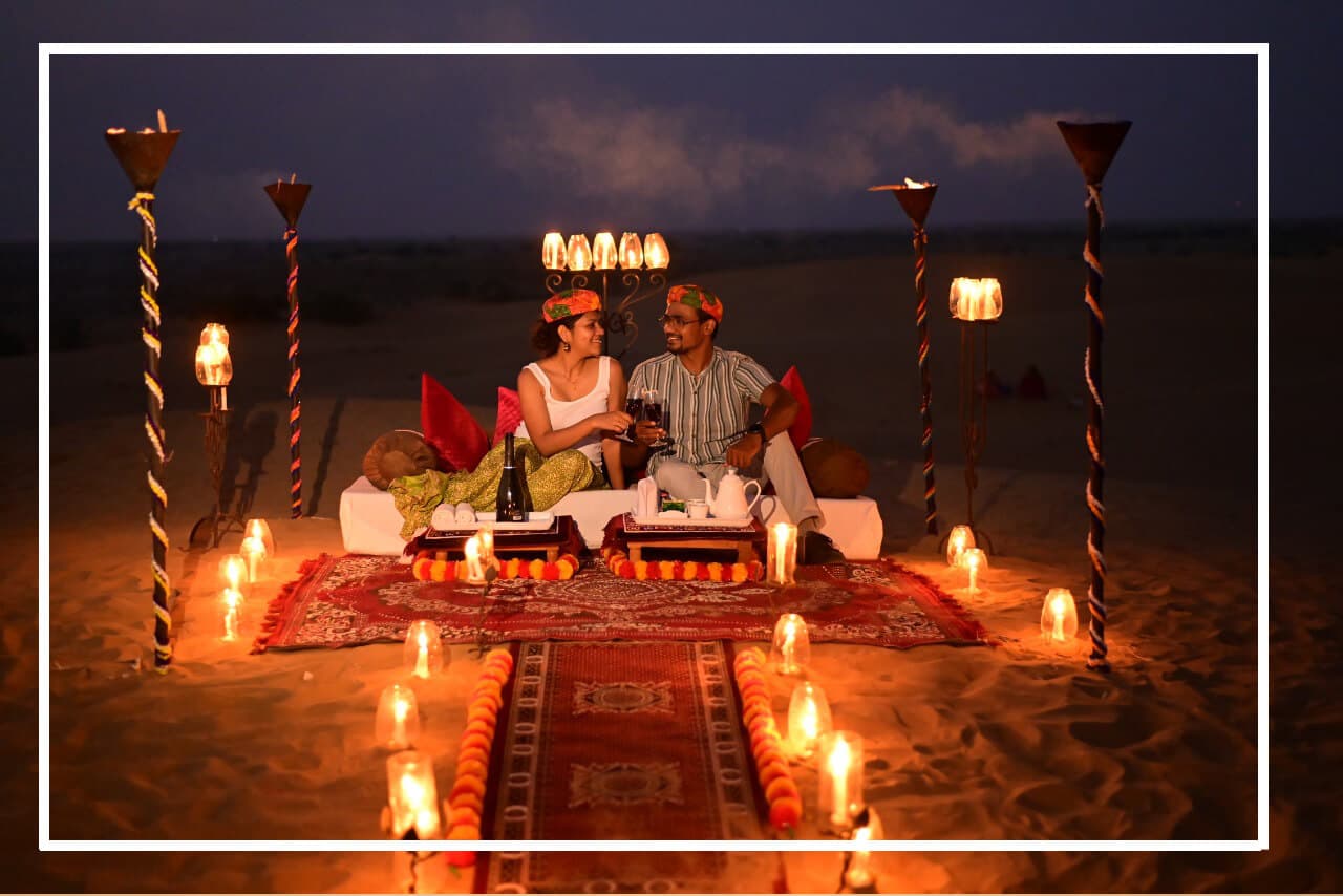 Candle light dinner on dunes